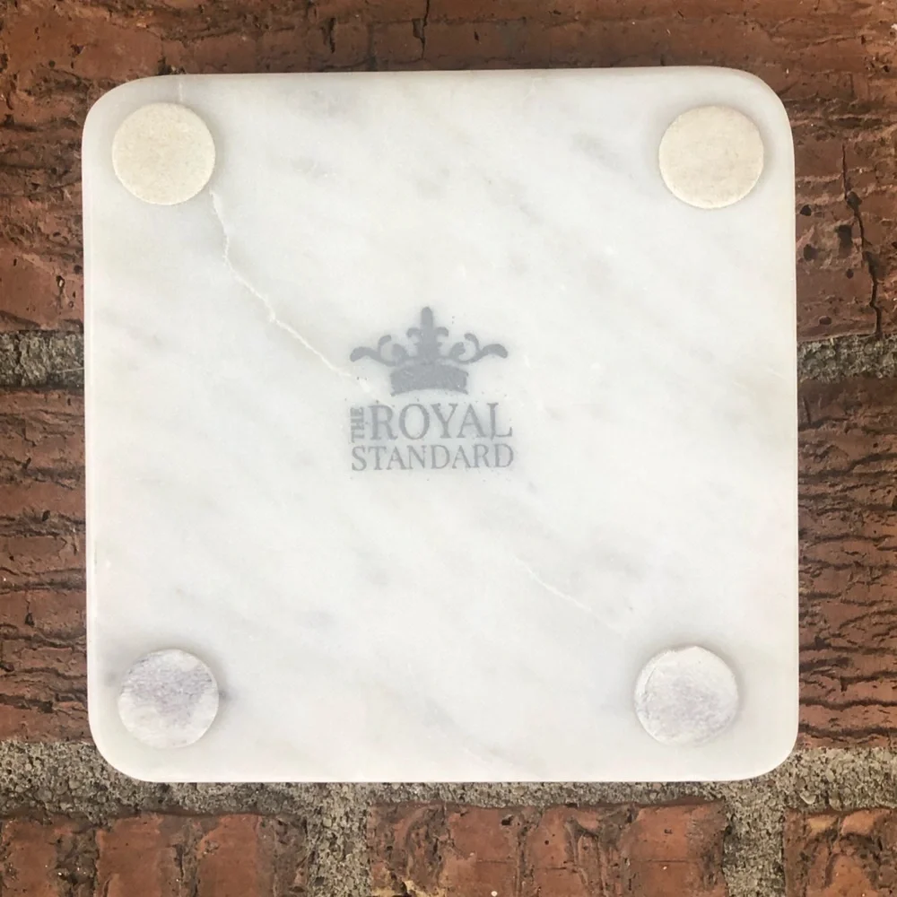 The Royal Standard White Marble Coaster with State of Mississippi Emblem in Gold
